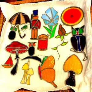 Handmade hanging stained glass. Various pieces shown $15 each.  Please select.